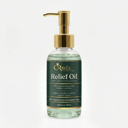 ORAVÉL Relief Oil soothing botanical elixir in clear pump bottle with gold pump on marble